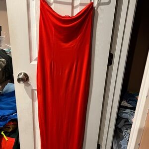 Brand new Tube Dress never been worn . The color is a vibrant coral